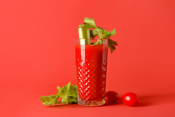 Fototapeta glass of bloody mary with celery and tomatoes on color background