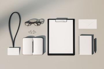 Aufkleber - Top view and close up of empty office supplies on white desktop. Clipboard, notepad, bad, envelope. Mock up, 3D Rendering.