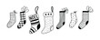 Doodle Christmas stocking set. Vector hand drawn socks.