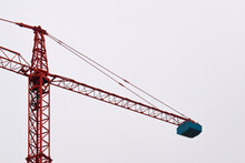 Red Crane On Construction Site