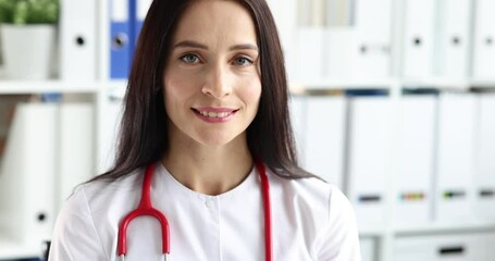 Wall Mural - Portrait of smiling female doctor in clinic 4k movie slow motion