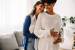 © (JLco) Julia Amaral - Happy lesbian couple expecting a baby