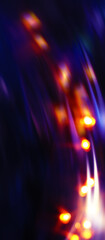 Wall Mural - bright abstract blurred background with bokeh. blurred lights, neon glowing lines on a dark backgrou