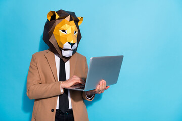 photo of smart marketer guy wear lion mask use netbook app typing message colleagues isolated over b