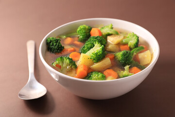 Wall Mural - bowl of vegetables and broth