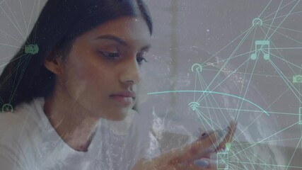 Poster - Animation of media icons over biracial businesswoman using smartphone