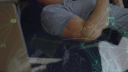 Poster - Animation of media icons over caucasian businessman using smartphone