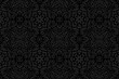 Embossed black background design. Trendy texture with geometric volumetric convex ethnic 3D pattern. Vector graphic template in the style of folk art for business background, wallpaper, presentations.