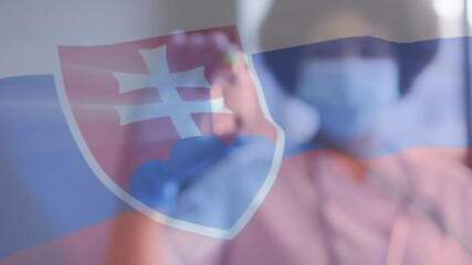 Wall Mural - Animation of flag of slovakia with female doctor in face mask and gloves holding covid vaccine