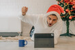 euphoric man at home for christmas shopping online