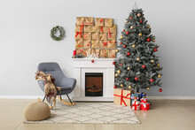 Interior Of Light Living Room With Fireplace, Christmas Tree And Advent Calendar