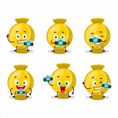 Canvas Print - Photographer profession emoticon with yellow candy wrap cartoon character