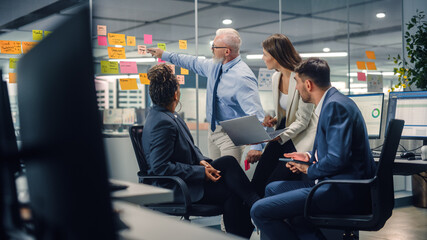Poster - In Modern Office: Diverse Team of Managers Use Laptop and Tablet Computers at a Company Meeting Discussing Business Projects. Young, Motivated and Experienced Employees Brainstorm in Conference Room.