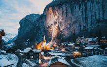 Amazing Touristic Alpine Village At Night In Winter With Famous Church And Staubbach Waterfall  Lauterbrunnen  Switzerland  Europe