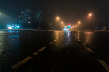 bus in foggy night city