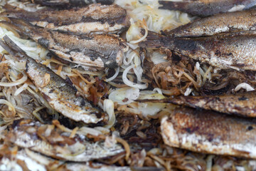 Wall Mural - Herring on a grill on the market