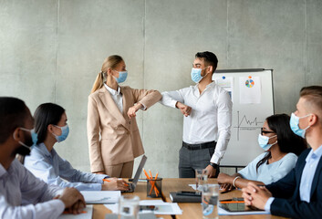 Poster - Pandemic Business Etiquette. Office Workers Bumping Elbows During Meeting In Conference Room