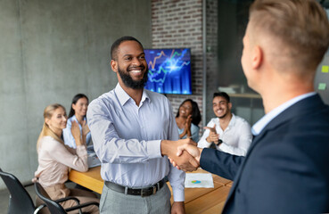 Poster - Company Ceo Handshaking With African American Man, Greeting New Employee In Office