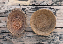 Wicker Baskets On A Wood Background