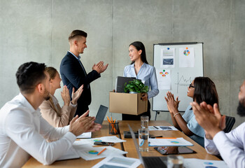 Poster - Group Of Business People Applauding, Greeting Asian Female Employee In Their Team