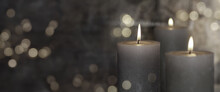 Burning Gray Candles In Haze With Mystery Bokeh. Moody Background With Short Depth Of Fieldfor Mourning And Keepsakes.