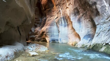 Wall Mural - Water stream in narrow slot canyon in Utah