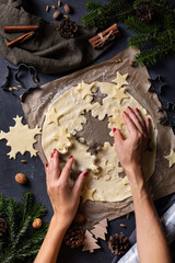  Christmas cooking and baking, female hands making cookies from dough