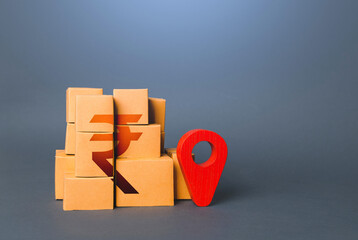 Wall Mural - Boxes with indian rupee won symbol and red location pin. Import export. Domestic manufacturer. Supply distribution of goods. Transportation delivering logistics, warehouse management. Trade in goods.