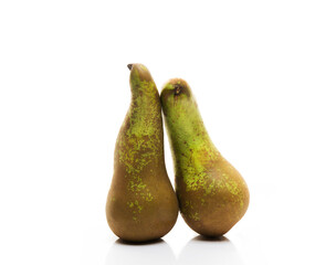 Two green conference pears isolated on a white background