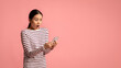 © Prostock-studio - Bad Message. Young Asian Woman Looking At Smartphone With Shock