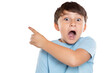 Child kid amazed surprised little boy pointing on ad advertising isolated on white