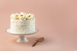 © Elena Elizarova - Beautiful tasty white cake with white cream; on cake stand