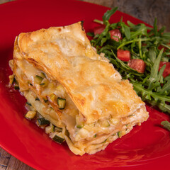 Recipe for vegetarian lasagna with goat cheese and arugula