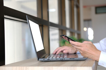 Poster - Working in an office, using a smartphone, a banner, a businesswoman or manager using a laptop computer, online marketing, and an office workplace