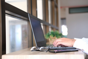 Poster - person working on laptop