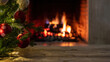 © Rawf8 - Christmas tree and burning fireplace background. Wooden table desk empty, template