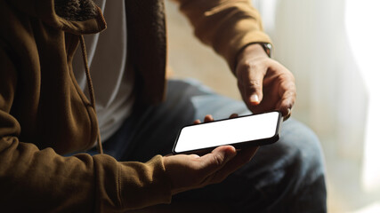 A man chatting on smartphone application. smartphone mockup.