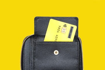 Credit card in a zip-around closure wallet