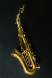 Fototapeta Tulipany - Saxophone jazz instruments. Soprano sax isolated. Saxophone music instrument closeup on black