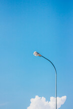 Low Angle View Of Street Light Against Blue Sky