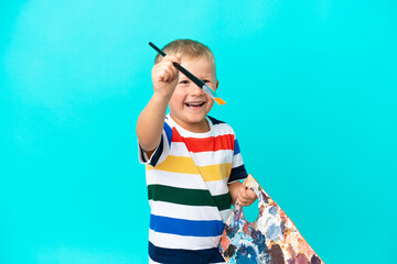 Little artist Russian boy over isolated background