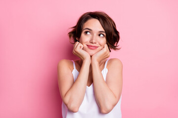 Sticker - Portrait of attractive cheery feminine girl creating solution isolated over pastel pink color background