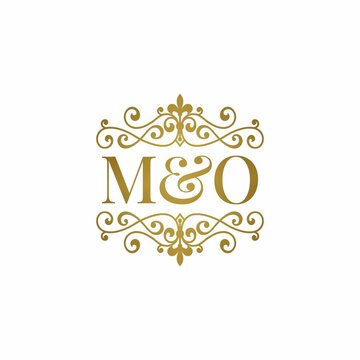 M&E initials logo ornament gold. Letter MO wedding ampersand or business partner symbol.	

