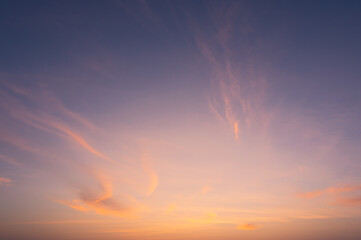 Wall Mural - beautiful vivid sky painted by the sun leaving bright golden shades.dense clouds in twilight sky in 