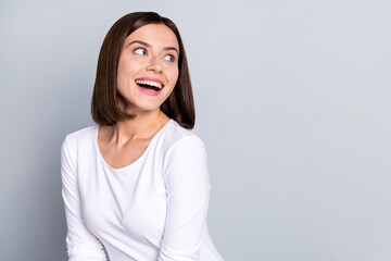 Wall Mural - photo of hooray bob hairdo young lady look empty space wear white shirt isolated on grey color backg