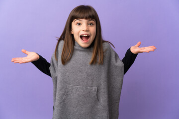 Little girl over isolated background with shocked facial expression