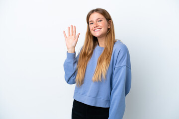 Wall Mural - Young blonde woman isolated on white background saluting with hand with happy expression