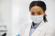 Closeup Portrait Of Young African American Female Doctor In Medical Face Mask