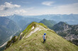 © ILLYA - Young child boy hiker conquer the peaks of amazing mountain trail Monte Montusel in Friuli-Venezia Giulia, Italy