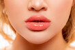 Sexy Lips. Part of Face, Young Woman close up. Perfect plump Lips bodily Lipstick. Peach Color of Lipstick on Large Lips. Perfect Makeup. Beautiful Lips Close-up. Makeup. Lip shiny Lipstick.         